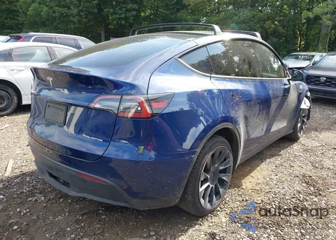 2022 Tesla Model Y Long Range Dual Motor All-Wheel Drive z USA, uszkodzony, nr VIN 7SAYGDEE7NF371470